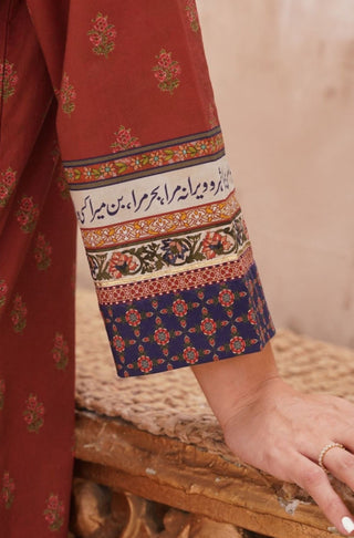 Sleeve Detail of Manto's Rust & Indigo Printed Fitrat Kurta with Urdu Calligraphy